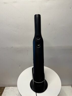 This handheld vacuum cleaner is a cordless Shark EVOPOWER model.